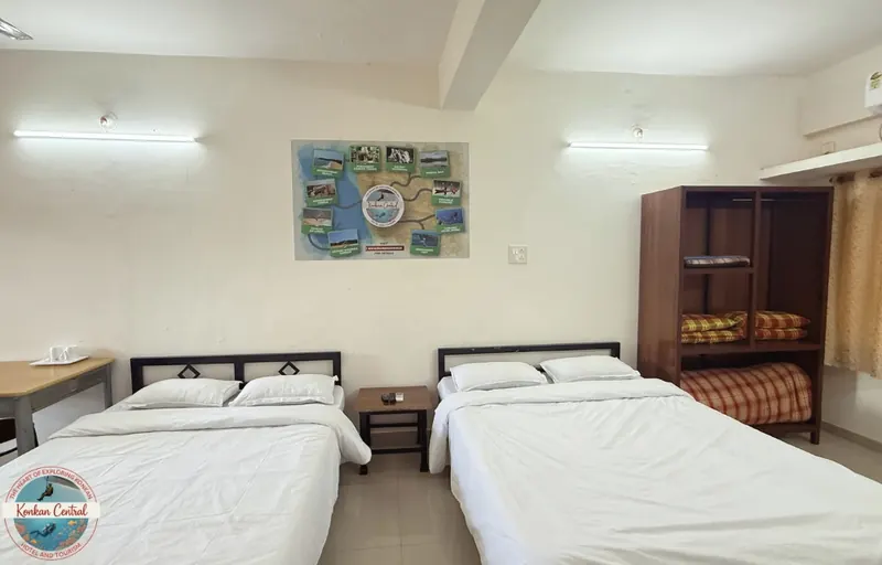 Two Queen Beds Room with the wardrobe and wall map